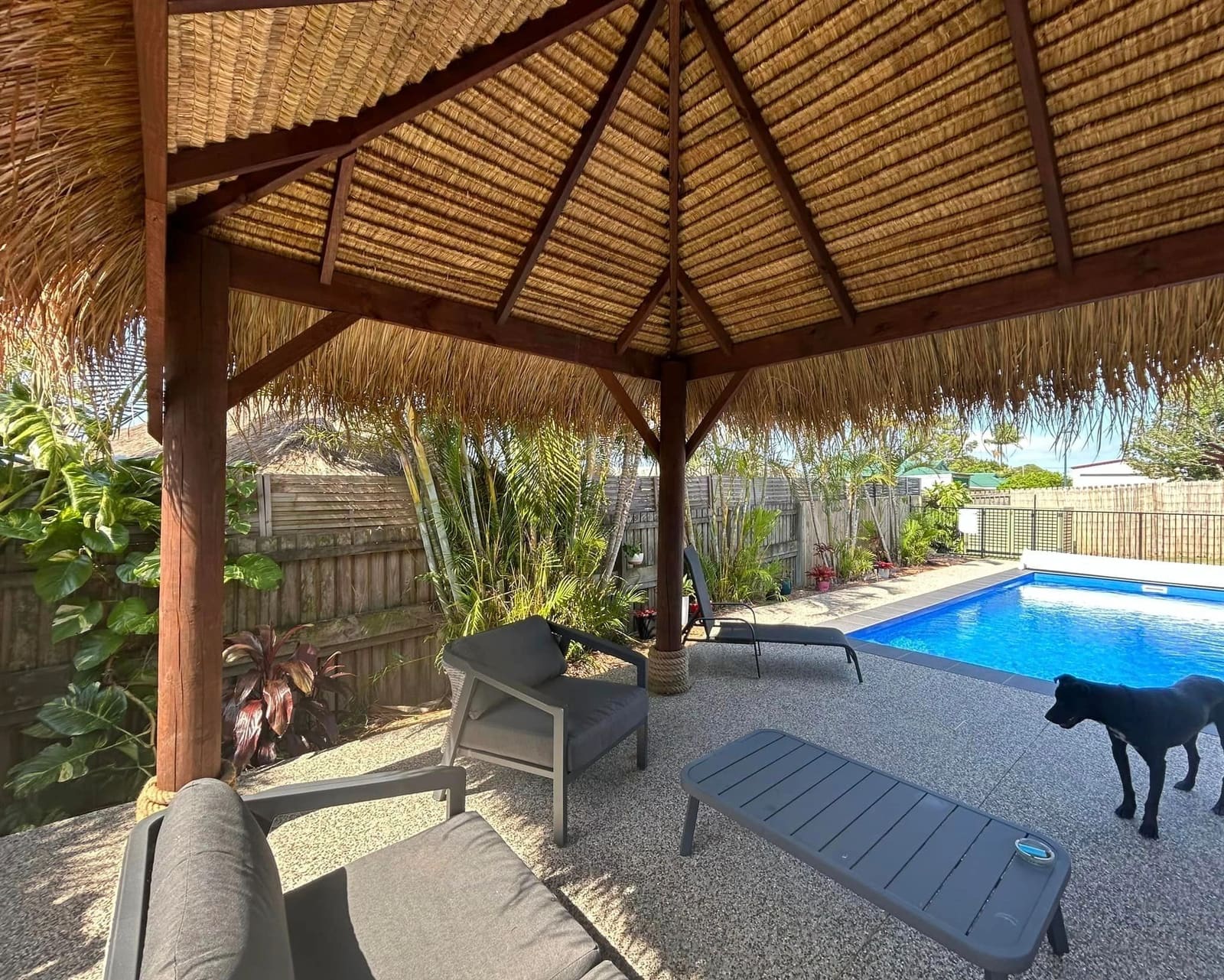 Thatched Bali hut beside the pool — photograph 4