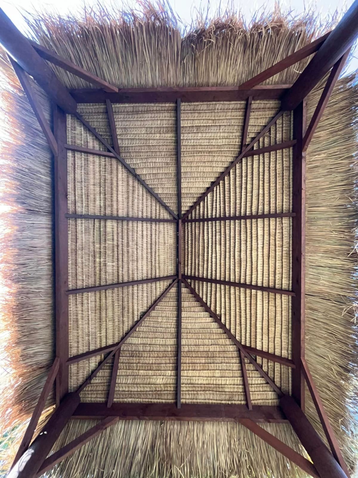 Thatched Bali hut beside the pool — photograph 7
