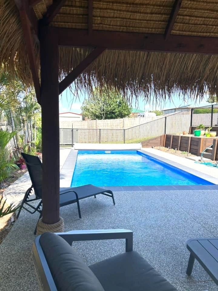 Thatched Bali hut beside the pool — photograph 2