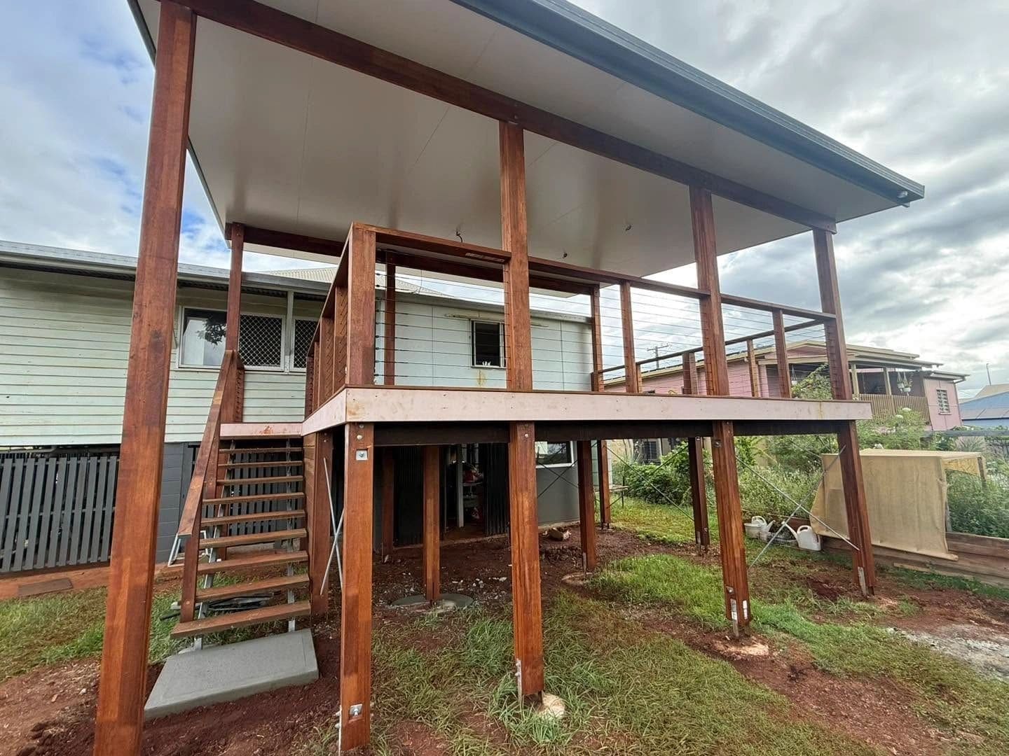 Elevated spotted gum deck with flyover roof — photograph 2