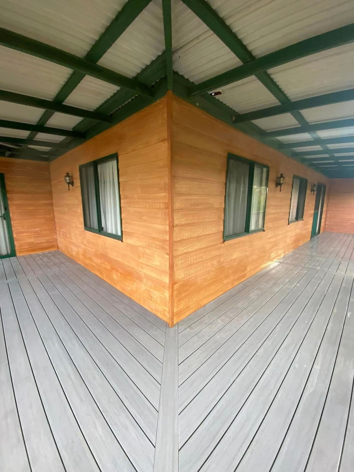 Queenslander deck rebuilt in EkoDeck Alpine Ash — photograph 3
