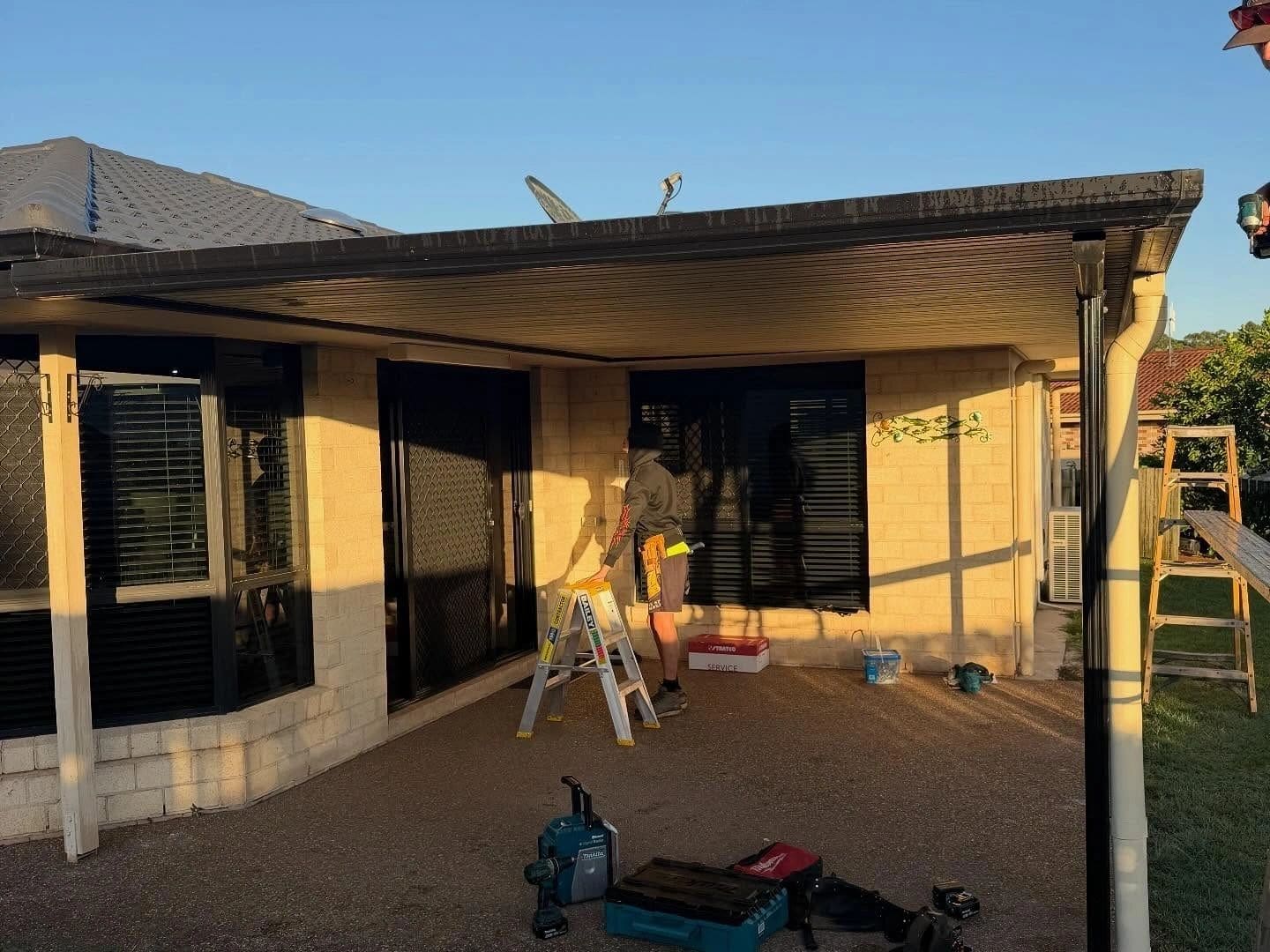 Retrofitted insulated patio roof — photograph 4