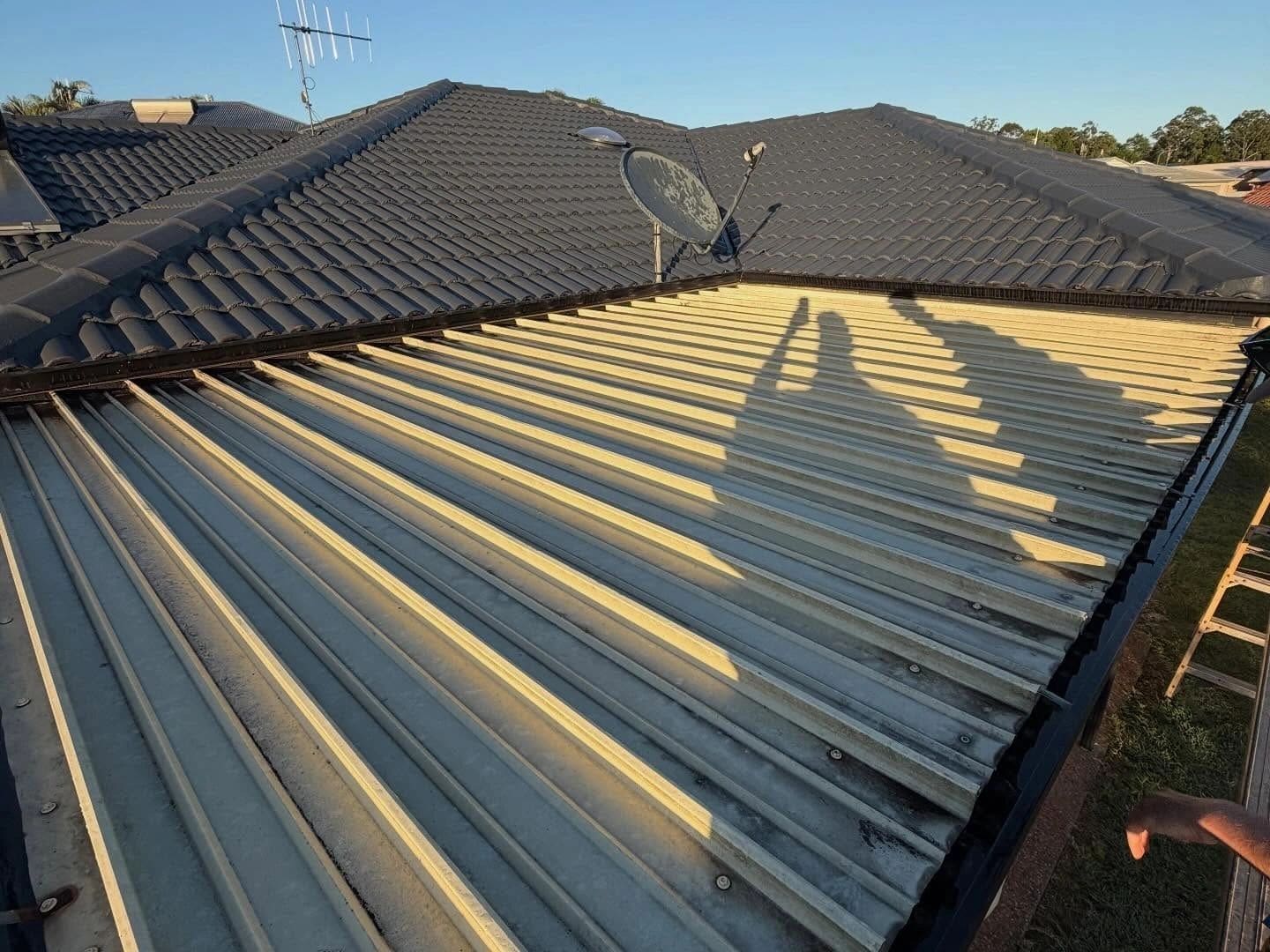 Retrofitted insulated patio roof — photograph 3