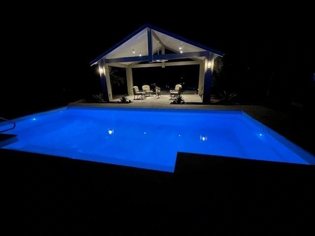 Pool pavilion with insulated Stratco roof — photograph 6