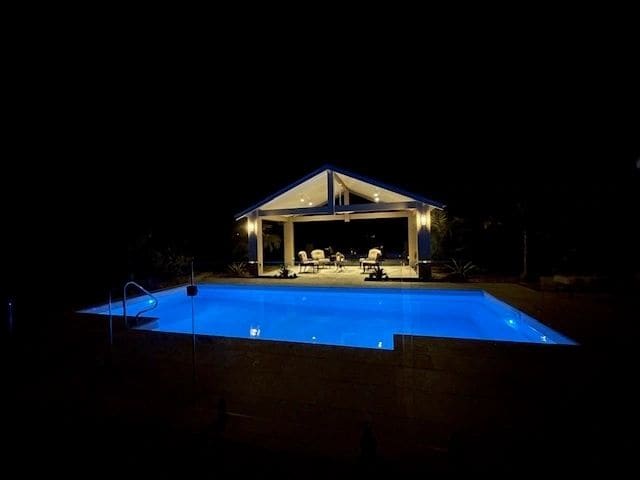 Pool pavilion with insulated Stratco roof — photograph 15