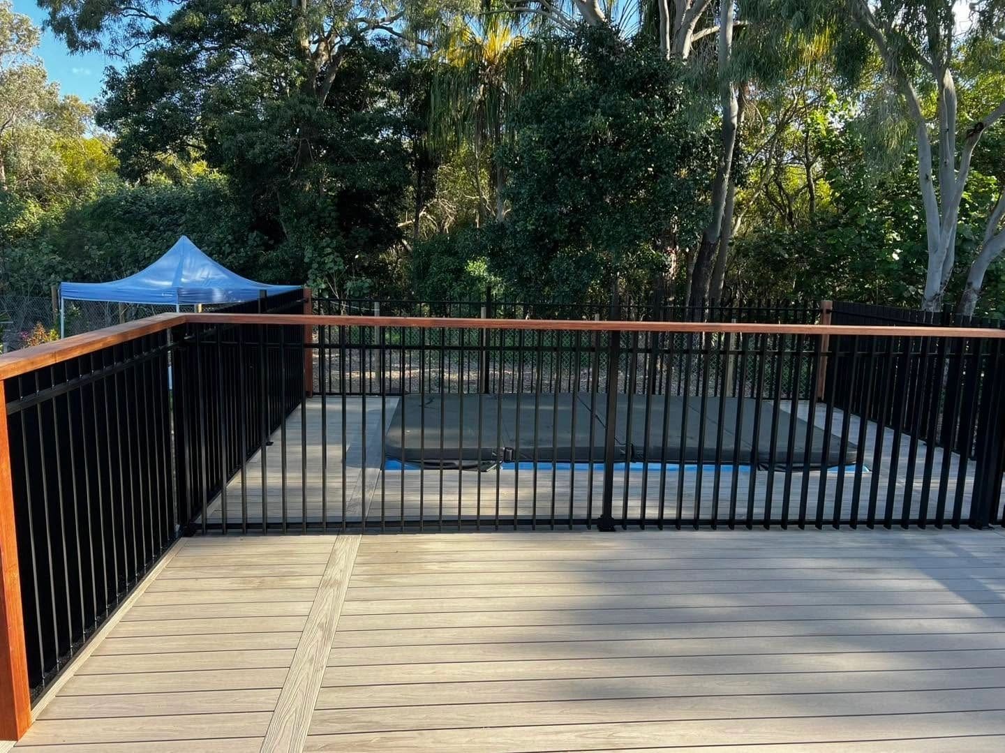Swim-spa deck in EkoDeck Alpine Ash