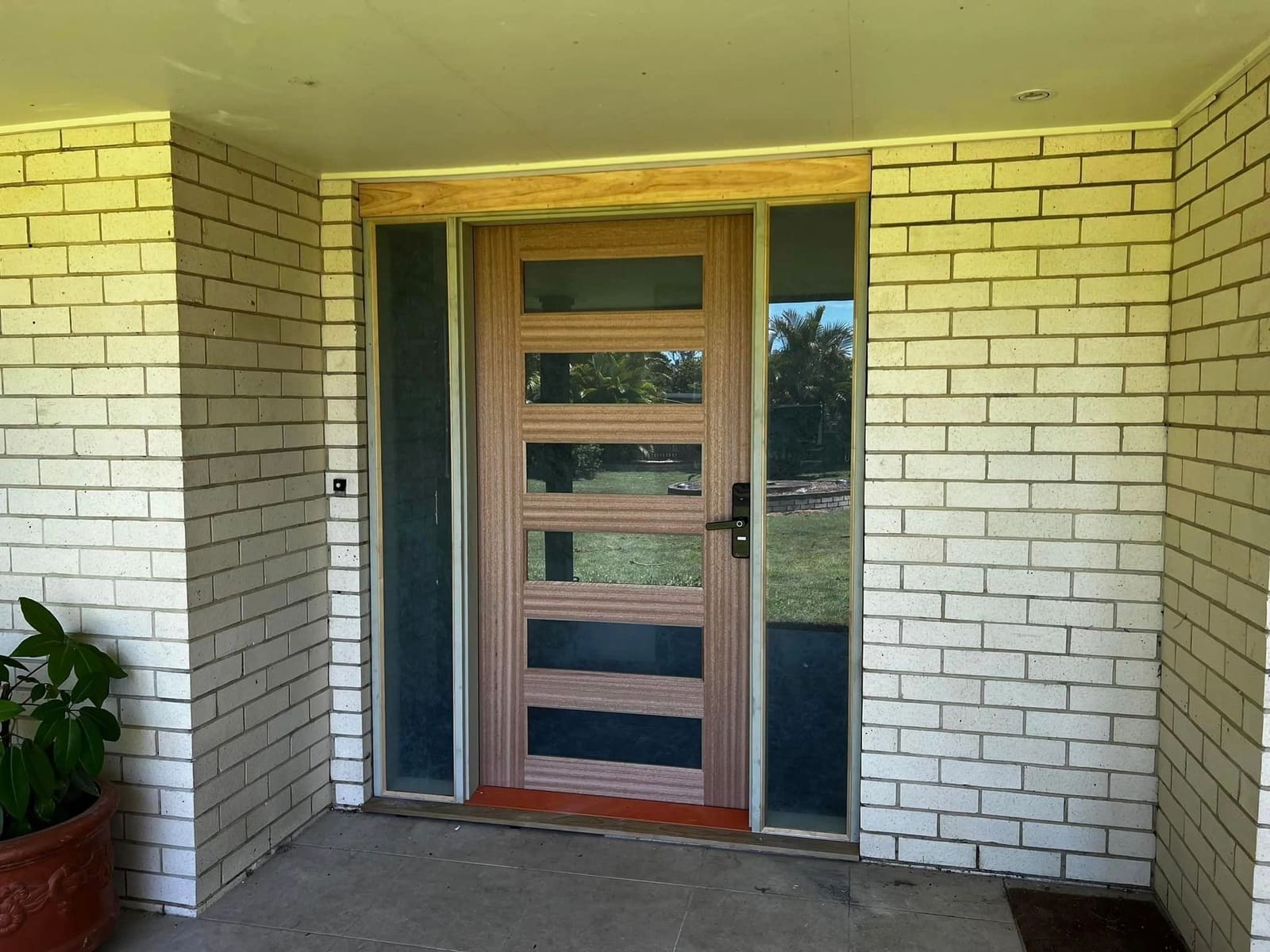 Wider entry door with side lights